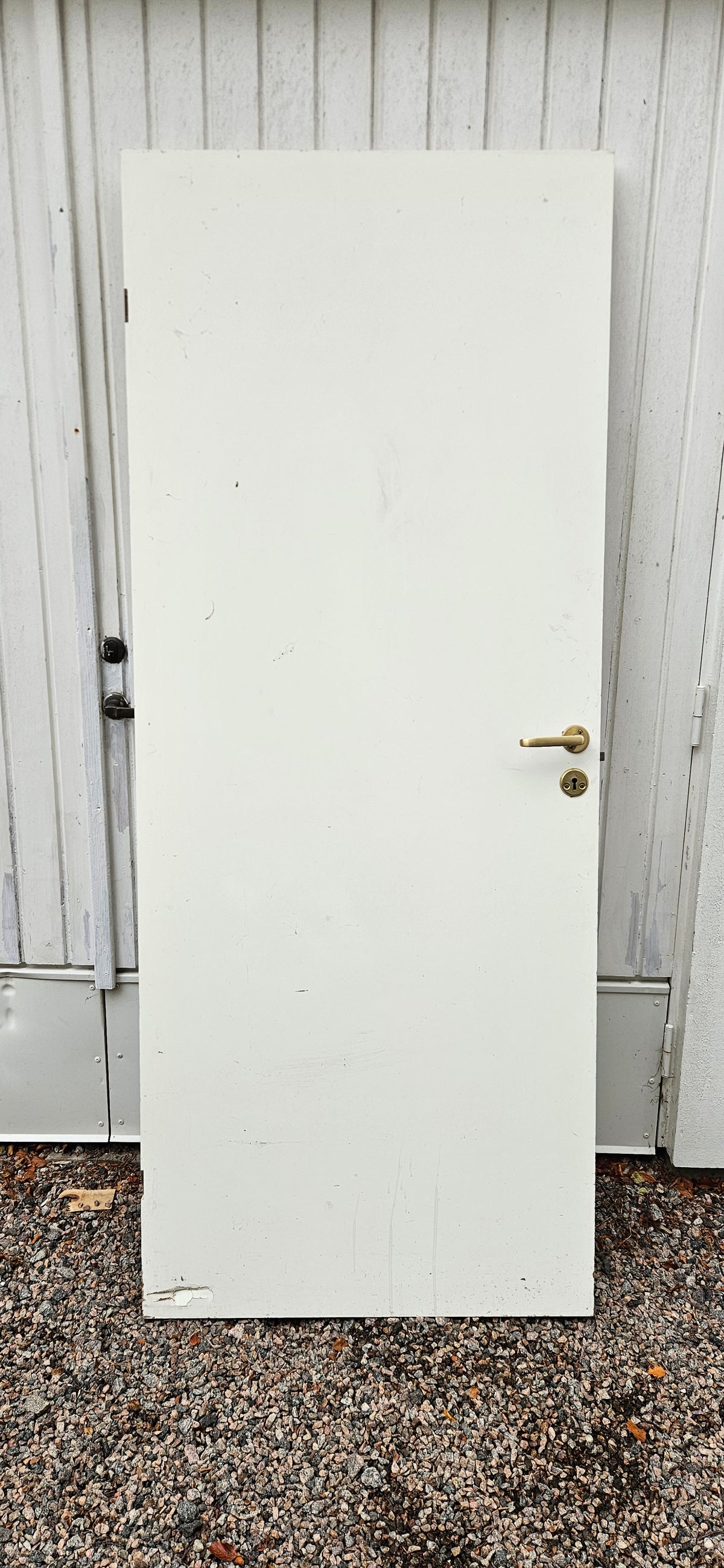 Vit innerdörr 117x205 cm, vändbar.