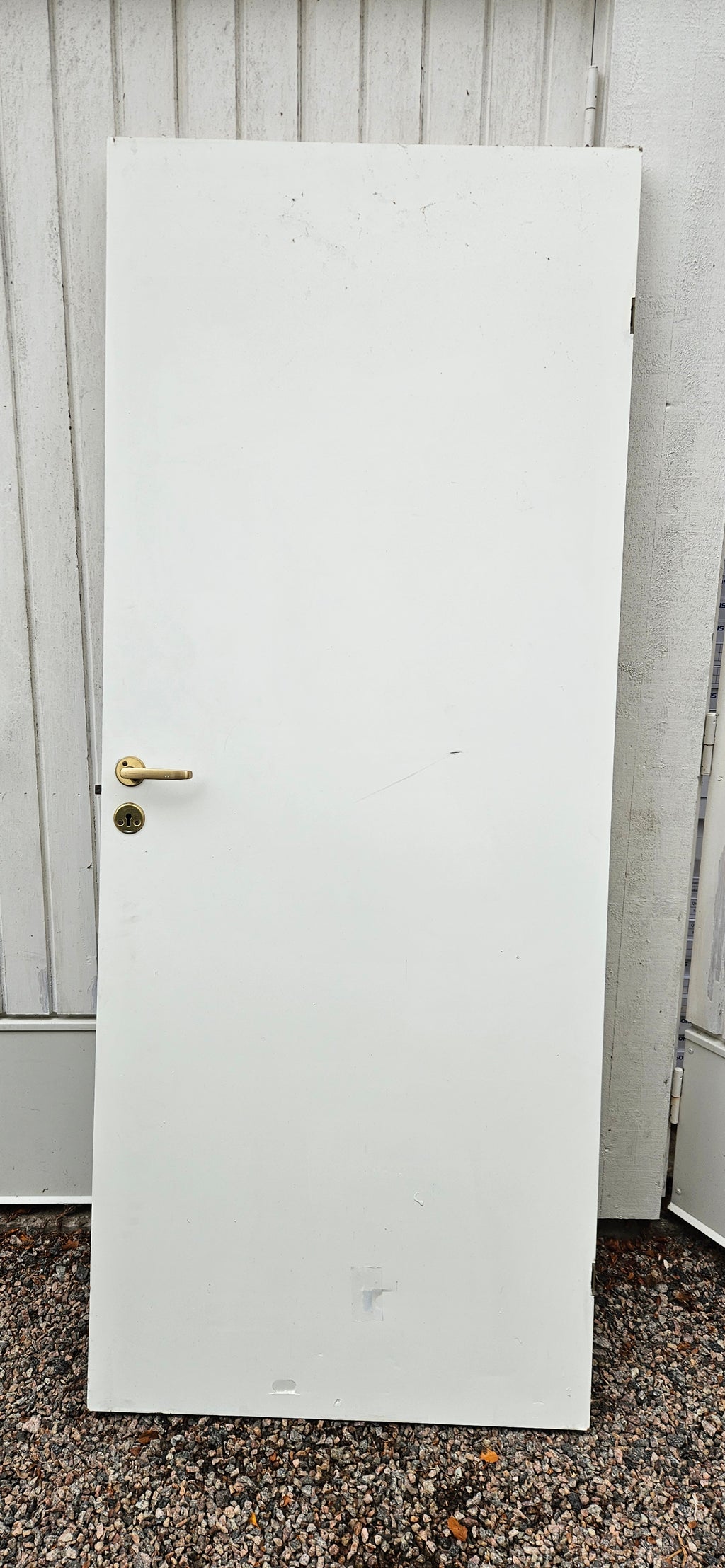 Vit innerdörr 117x205 cm, vändbar.